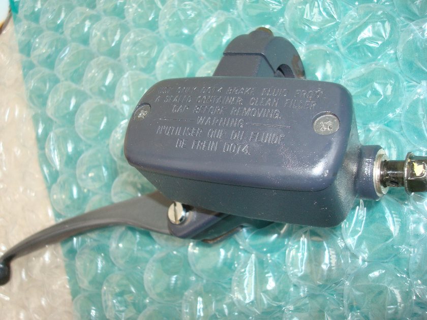 Goldwing GL1500 88+ Brake master with lever, mount clamp and bolts.